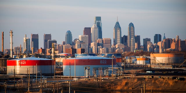 The Philadelphia Energy Solutions oil refinery owned by The Carlyle Group is seen in front of the Philadelphia skyline March 24, 2014. Picture taken March 24, 2014.       To match OIL-ETHANOL/LOBBY       REUTERS/David M. Parrott  