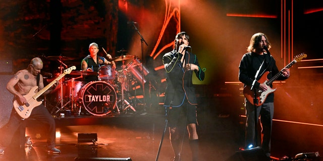 Musical guest Red Hot Chili Peppers performs on "The Tonight Show Starring Jimmy Fallon." The show was also broadcast on "Jimmy Kimmel Live!"