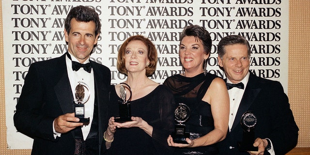 Tony Award winners, from left to right, James Naughton, best actor in "City of Angels," Maggie Smith, best actress for "Lettice and Lovage," Tyne Daly, best actress for "Gypsy," and Robert Morse, best actor for "Iru" pose with their trophies in New York on June 3, 1990. 