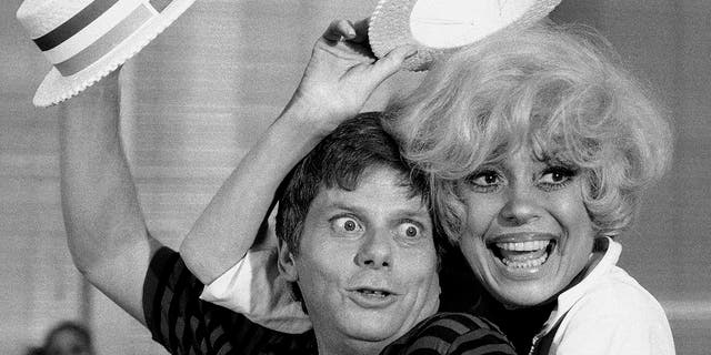 Robert Morse, left, and  Carol Channing appear during a rehearsal for the road company production of "Sugar Babies" in New York on July 18, 1977.