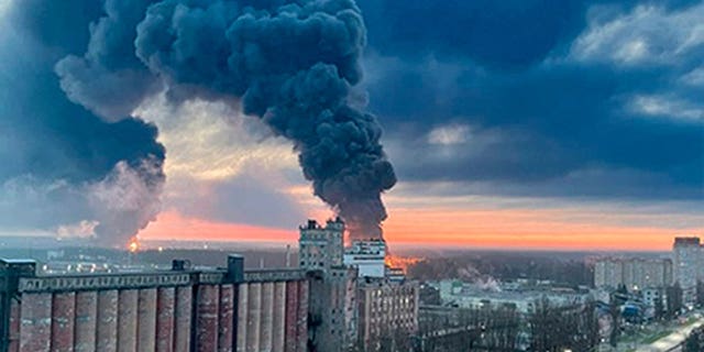 Smoke rises from oil spills hit by fire in Bryansk, Russia, on April 25 in a photo taken by an anonymous source.