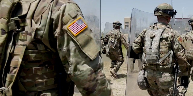Dozens of guard members train in Mission, TX, in preparation for a mass migration event when Title 42 is lifted in May, on Thursday, April 7, 2022. (FOX)