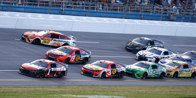 The No. 23 and No. 45 cars of Hamlin's 23XI Racing team were wrecked in an accident caused by Kyle Larson at the Geico 500.