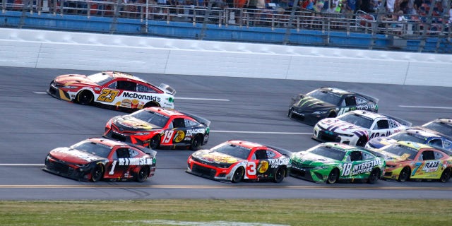 The No. 23 and No. 45 cars of Hamlin's 23XI Racing team were wrecked in an accident caused by Kyle Larson at the Geico 500.