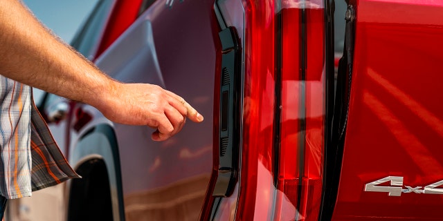 The Tundra's tailgate can be opened with buttons located on the sides of the truck.