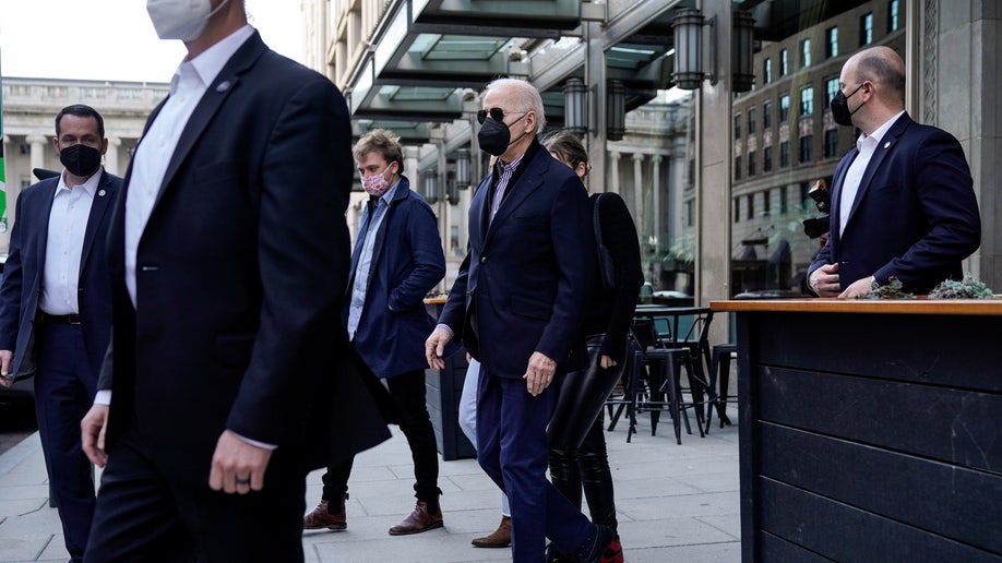 U.S. President Joe Biden departs the Hamilton restaurant with where he had lunch with his granddaughters Finnegan Biden, Naomi Biden, and Peter Neal in Washington, U.S., February 19, 2022. 