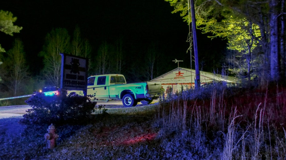 Law enforcement investigates the scene of a fatal robbery at a Georgia gun range