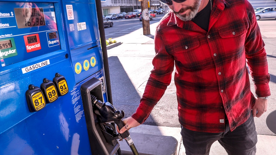Jesse Espersen from Topanga fills his SUV with 16.536 gallons of Super+ gas at 7.559 per gallon for 125 dollars at a Mobil station at the corner of La Cienega Blvd. and Beverly Blvd.