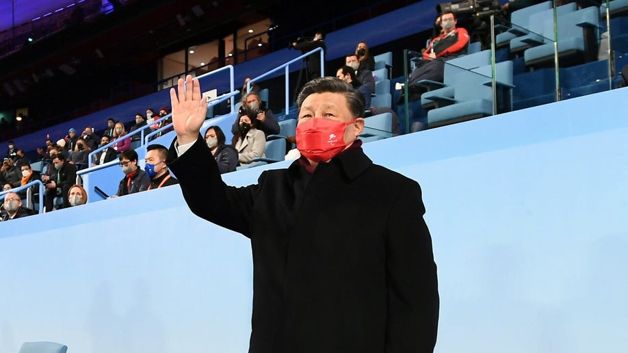 Chinese President Xi Jinping waves during the closing ceremony of the Beijing 2022 Paralympic Winter Games at the National Stadium in Beijing, capital of China