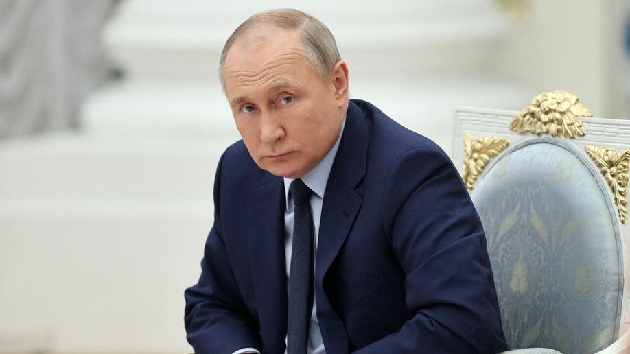 Russian President Vladimir Putin looks on as he holds a meeting of the Russia - Land of Opportunity platform supervisory board at the Catherine's Hall of the Kremlin
