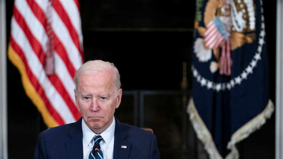 President Joe Biden listens during a meeting with Inspectors General in the State Dining Room at the White House 