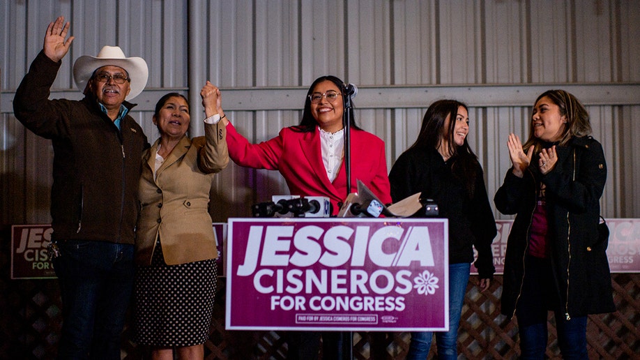 Democratic U.S. congressional candidate Jessica Cisneros (TX-28) concludes a speech alongside her family during a watch party on March 01, 2022 in Laredo, Texas. Late results hint that Cisneros and U.S. Rep. Henry Cuellar (D-TX) could face a primary runoff with neither getting more than the 50 percent necessary for an outright win