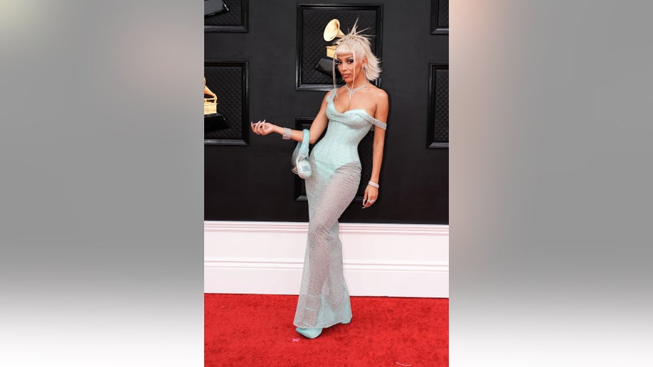 Grammys 2022: Stars arrive on red carpet ahead of music’s biggest night