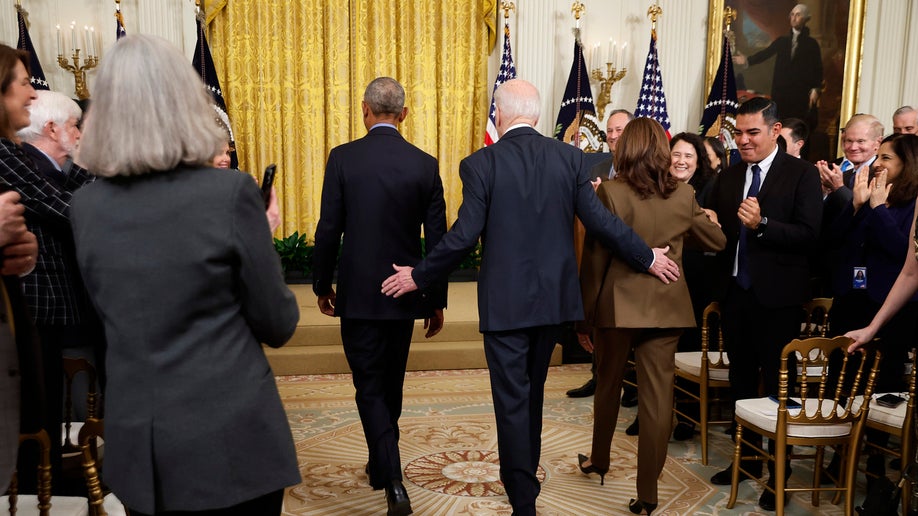 Vice President Kamala Harris, former President Barack Obama, and U.S. President Joe Biden arrive for an event to mark the 2010 passage of the Affordable Care Act in the East Room of the White House on April 5, 2022 in Washington, DC. With then-Vice President Joe Biden by his side, Obama signed 'Obamacare' into law on March 23, 2010. 