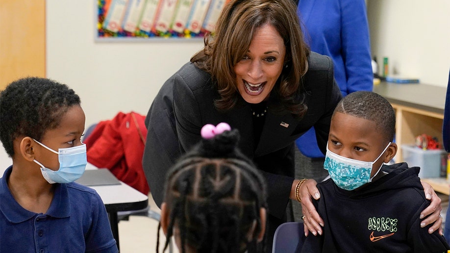 Vice President Kamala Harris visits with students at Thomas Elementary School in Washington, Monday, April 4, 2022. (AP Photo/Susan Walsh)