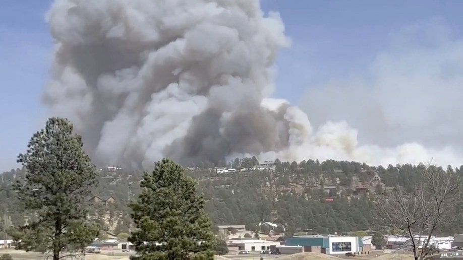 Smoke rises from New Mexico's McBride Fire