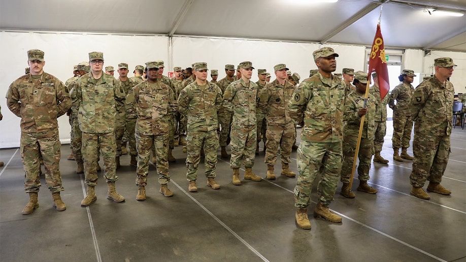 U.S. Soldiers of the 330th Movement Control Battalion stand in formation at Zagan, Poland, April 1, 2022. (U.S. Army photo by Sgt. Joseph Aleman)