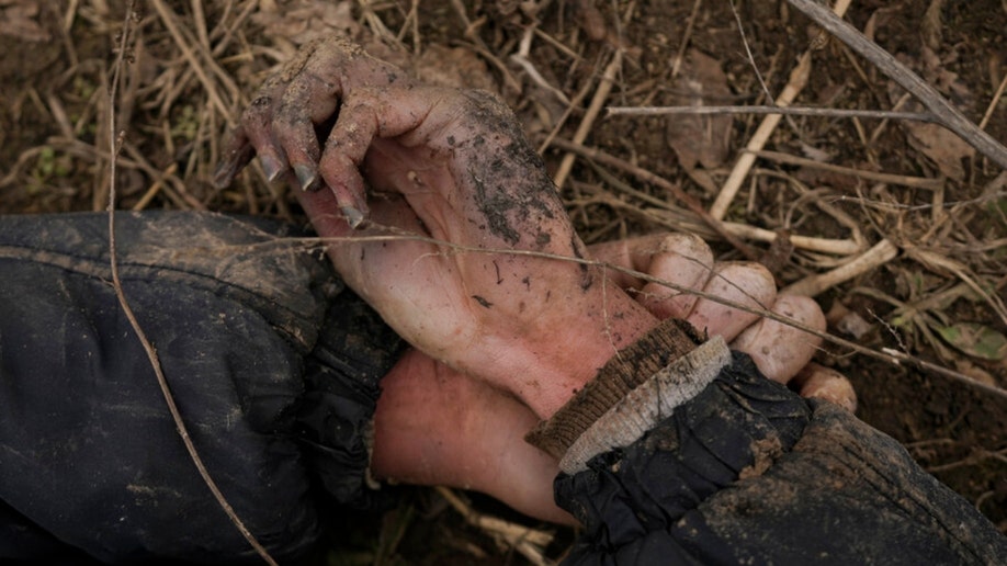 The body of a Ukrainian man in a Andriivka field