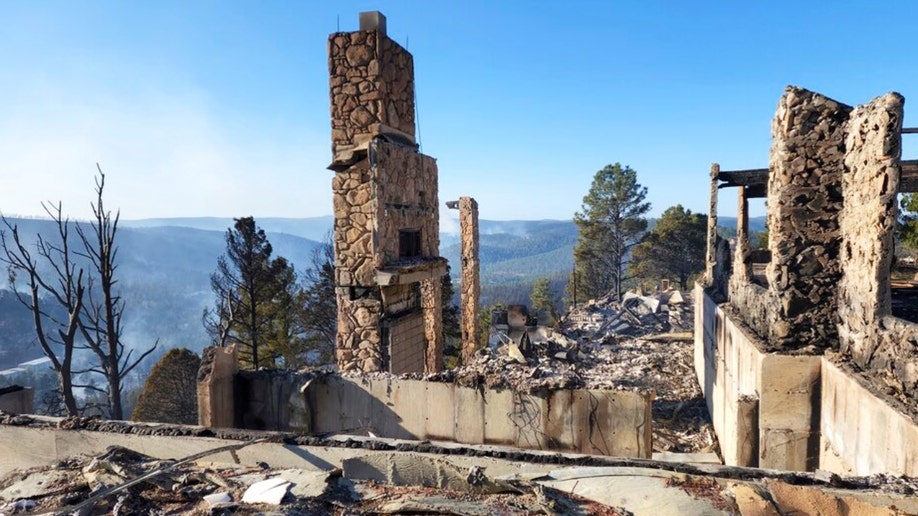 The remains of Ruidoso, New Mexico home burned by a wildfire