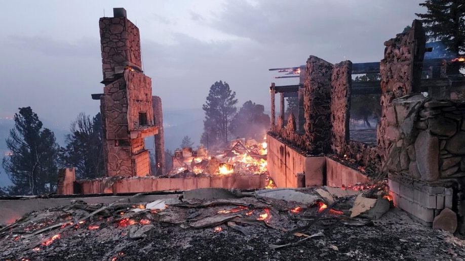 The remains of Ruidoso, New Mexico home burned by a wildfire