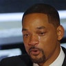 Will Smith cries as he accepts the Oscar for Best Actor in "King Richard" at the 94th Academy Awards in Hollywood, Los Angeles.