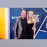 Dennis Quaid and Laura Savoie attend the 2022 CMT Music Awards.