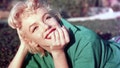PALM SPRINGS, CA - 1954: Actress Marilyn Monroe poses for a portrait laying on the grass in 1954 in Palm Springs, California. (Photo by Baron/Hulton Archive/Getty Images) - Fox News