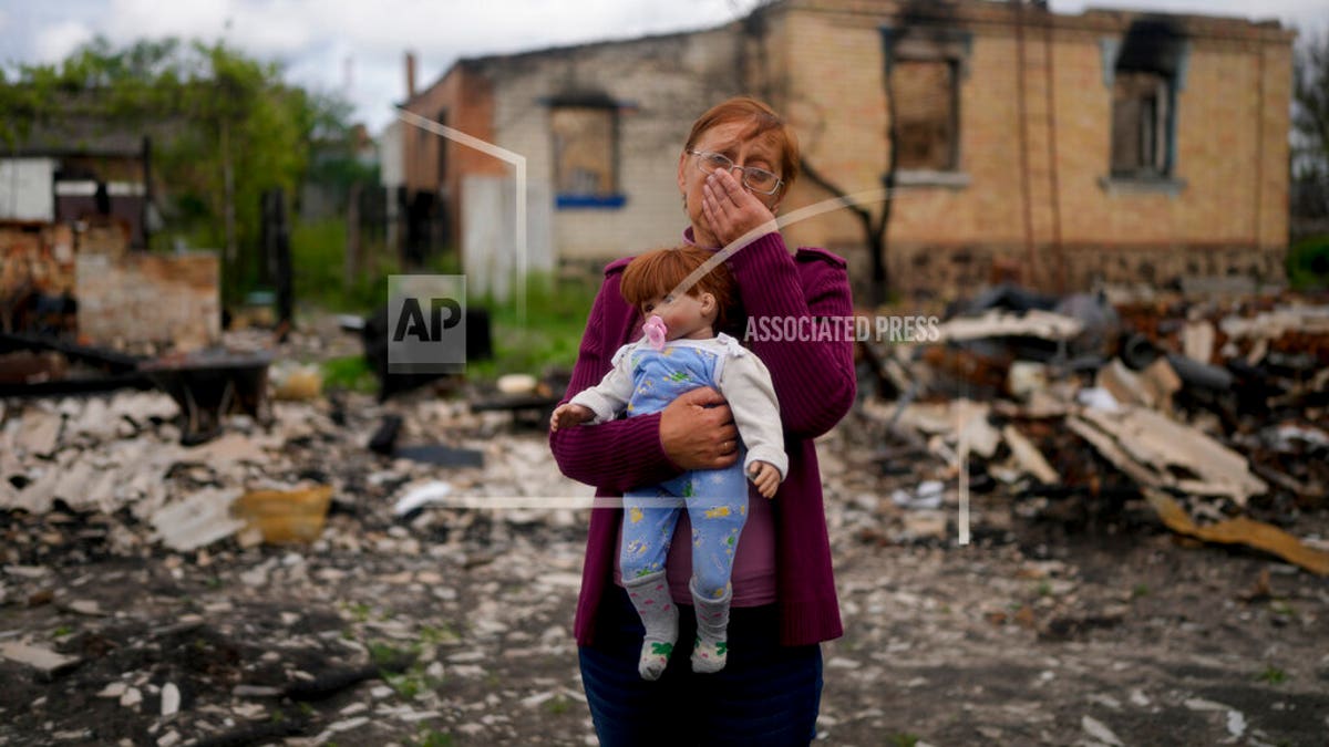 Ukrainian woman finds granddaughter's doll in destroyed home