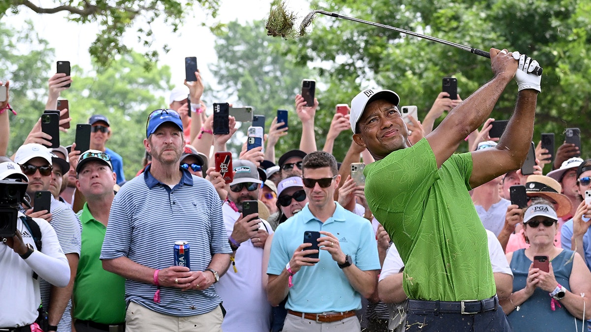 Golf fan who went viral for holding beer while watching Tiger Woods now has official merchandise Fox News