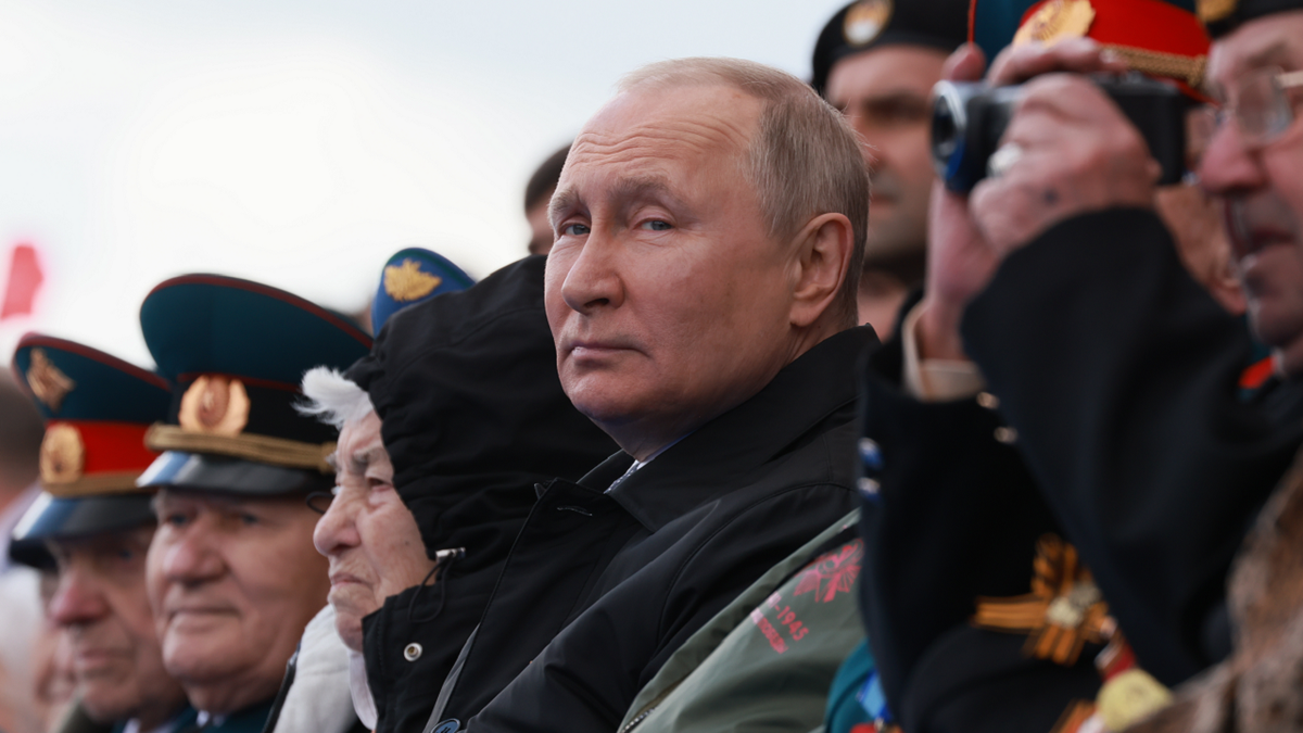 Russian President Vladimir Putin looks on during the Victory Day military parade marking the 77th anniversary of the end of World War II in Moscow, Russia, on Monday, May 9.