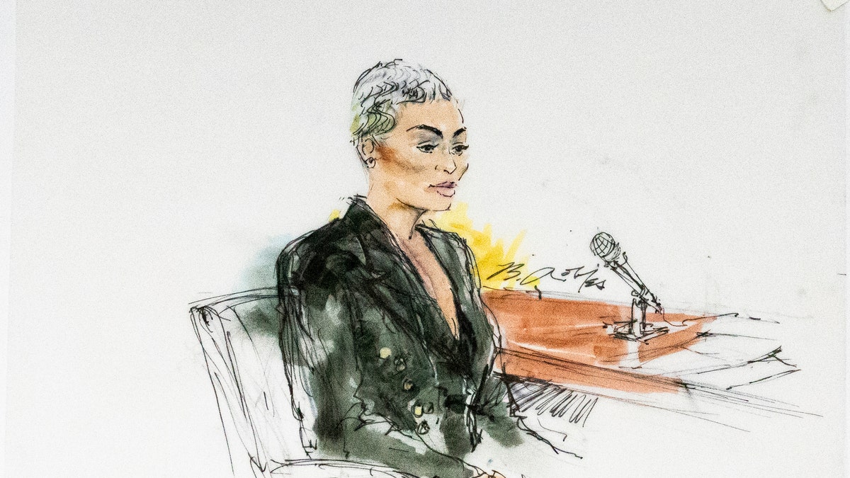 In this courtroom artist sketch, former reality television star Blac Chyna sits in court in Los Angeles, Tuesday, April 19, 2022. ?The Kardashian-Jenner family have won in the defamation lawsuit brought against them by Blac Chyna.