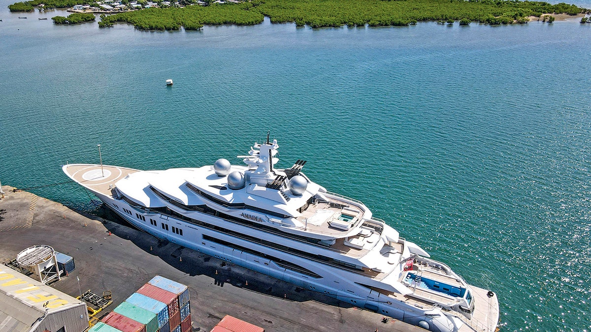 FILE - The superyacht Amadea is docked at the Queens Wharf in Lautoka, Fiji, on April 15 2022. A judge in Fiji has ruled that U.S. authorities can seize the Russian-owned superyacht — but has put a hold on his order until at least Friday, May 6, while defense lawyers mount a challenge. (Leon Lord/Fiji Sun via AP, File)