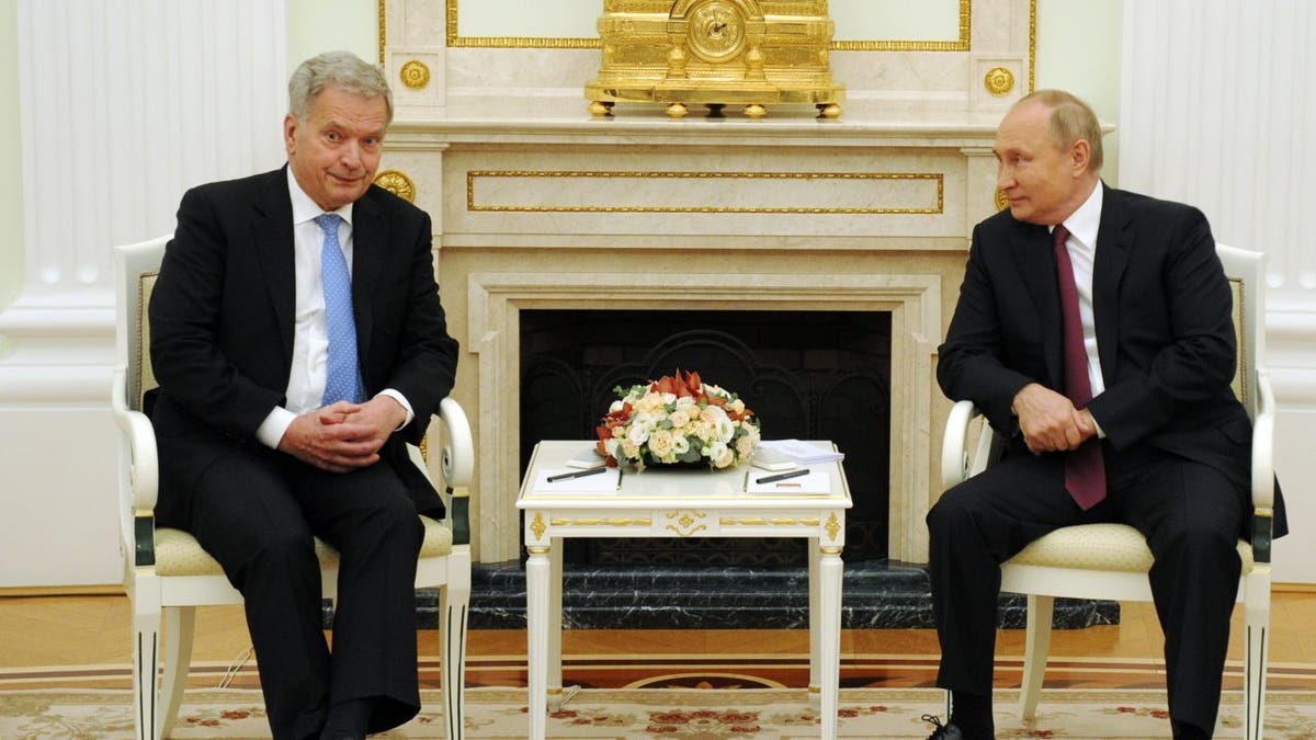 FILE - Russian President Vladimir Putin, right, and Finnish President Sauli Niinisto talk during their meeting in the Kremlin in Moscow, Russia, Oct. 29, 2021. Niinisto, the Western leader who appeared to have the best rapport with Putin before the Ukraine war, is expected to announce his stance on NATO membership on Thursday, May 12, 2022.