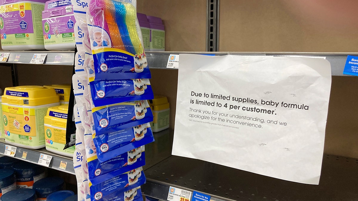 Baby formula supply sign at grocery store