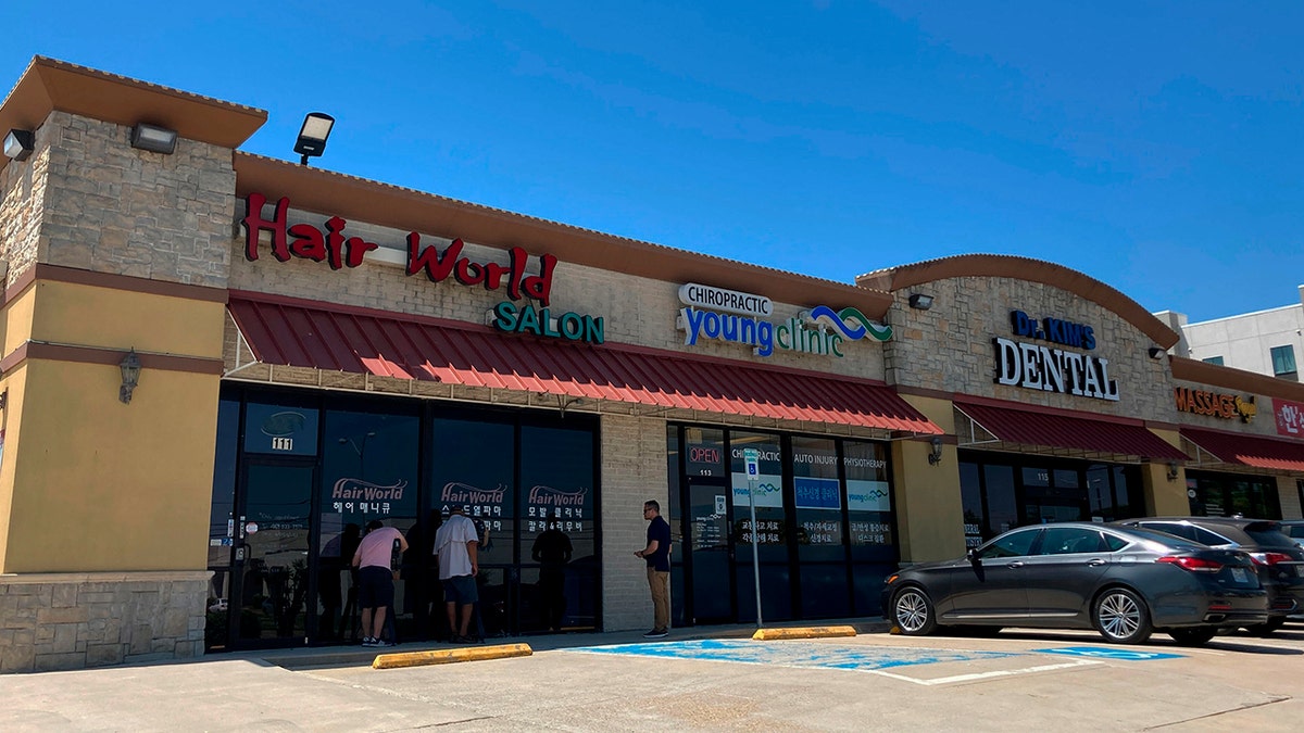 This photo shows the exterior of Hair World Salon in Dallas on Thursday, May 12, 2022. (AP Photo/Jamie Stengle)