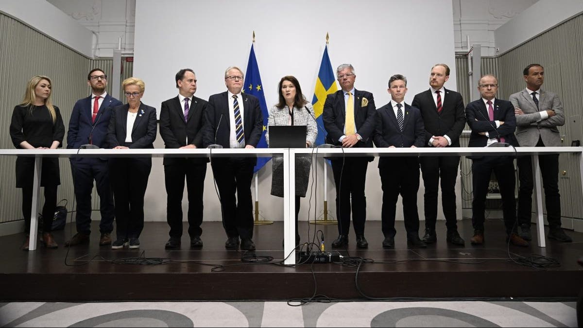 Minister of Defense Peter Hultqvist, center left, Minister of Foreign Affairs Ann Linde, center, and Sweden's security policy analysis group announce their report during a press conference in Stockholm, Sweden, Friday May 13, 2022. 