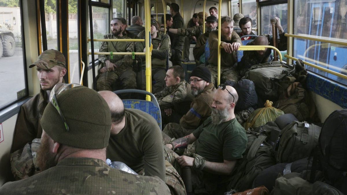 Ukrainian soldiers leave Mariupol's Azovstal steel factory