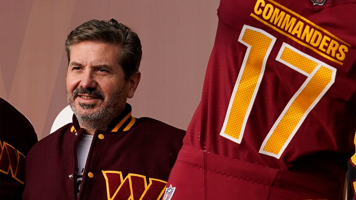 Daniel Snyder with the new team logo