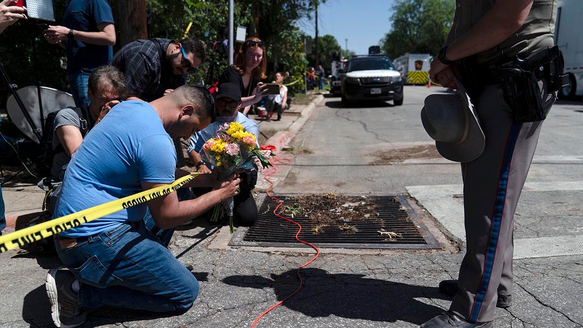 People mourn following the Texas School Shooting