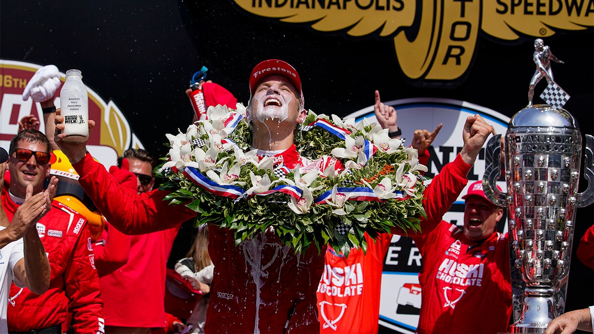 Marcus Ericsson, of Sweden, celebrates after winning the Indianapolis 500 auto race at Indianapolis Motor Speedway in Indianapolis, Sunday, May 29, 2022.