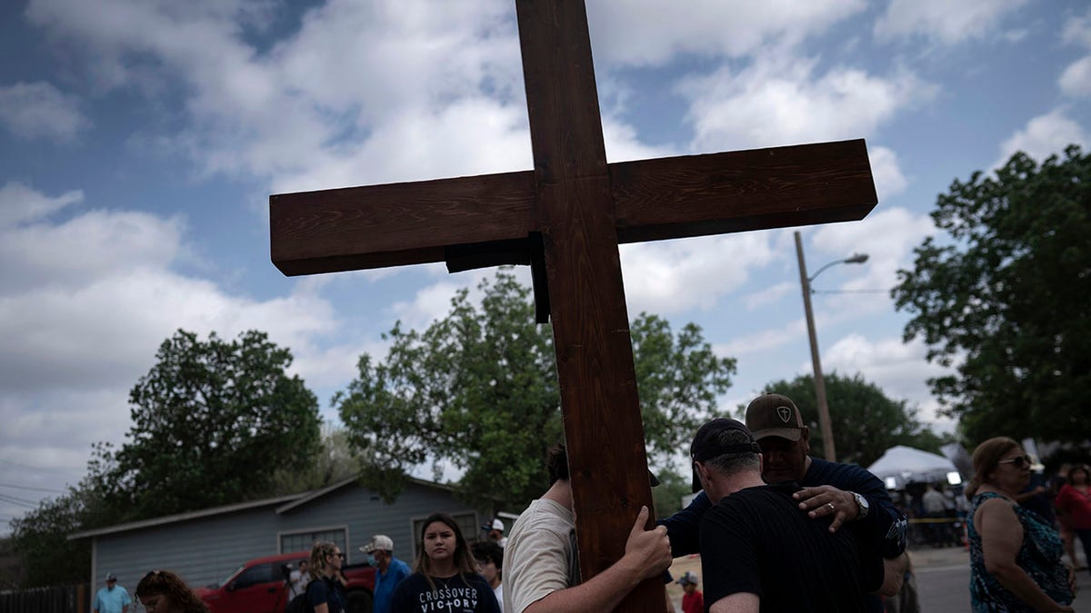 A cross seen at Robb Elementary School in Uvalde, Texas