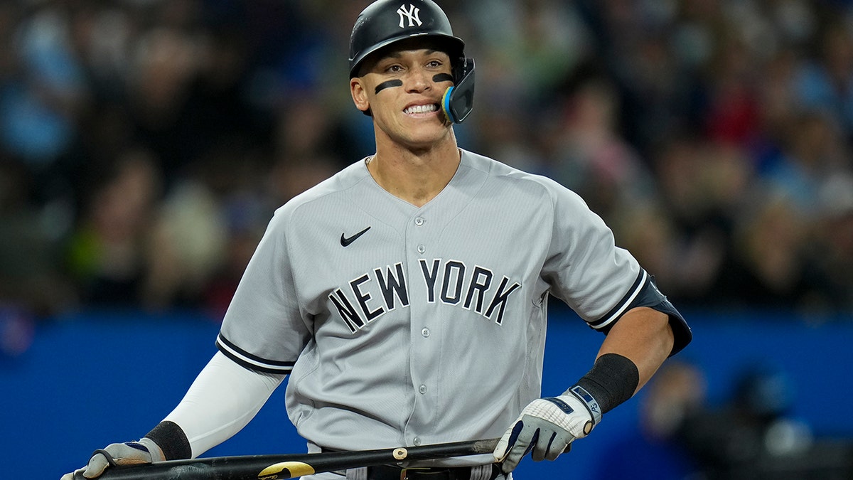 New York Yankees' Aaron Judge (99) reacts after striking out against the Toronto Blue Jays during the third inning of a baseball game Tuesday, May 3, 2022, in Toronto. 