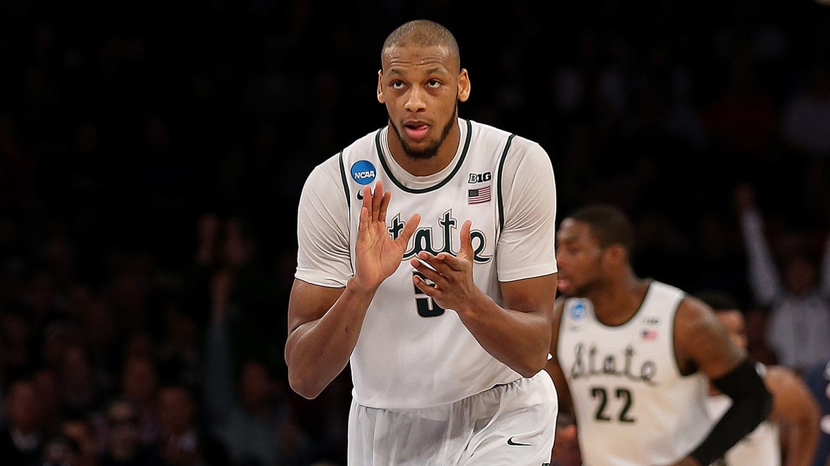 Adreian Payne #5 of the Michigan State Spartans reacts after a basket against the Connecticut Huskies during the East Regional Final of the 2014 NCAA Men's Basketball Tournament at Madison Square Garden on March 30, 2014 in New York City. 