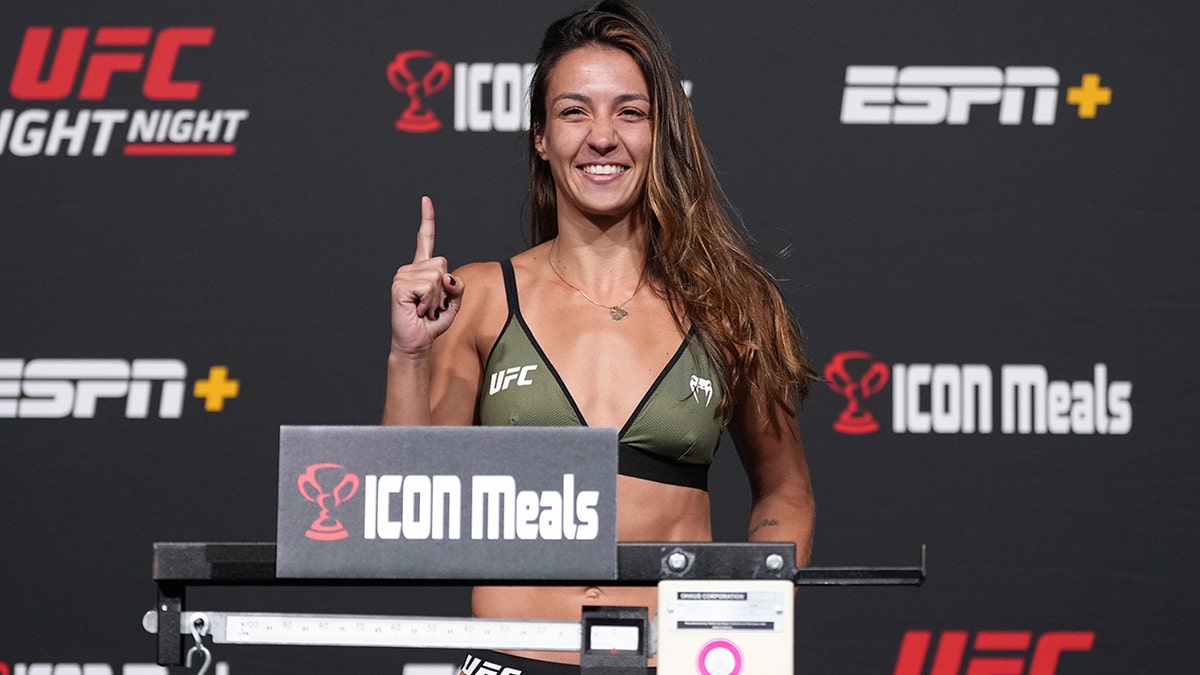 Amanda Ribas of Brazil poses on the scale during the UFC Fight Night weigh-in at UFC APEX on May 13, 2022 in Las Vegas, Nevada.