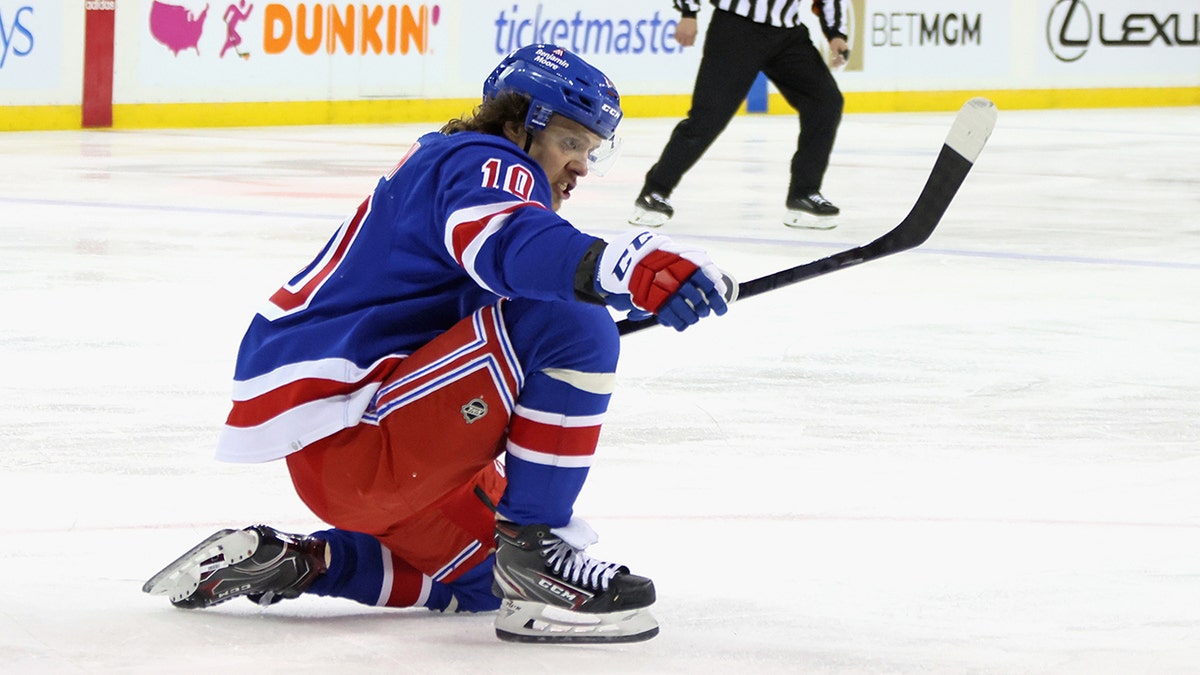 Artemi Panarin #10 of the New York Rangers celebrates his game winning overtime goal against the Pittsburgh Penguins in Game Seven of the First Round of the 2022 Stanley Cup Playoffs at Madison Square Garden on May 15, 2022 in New York City.