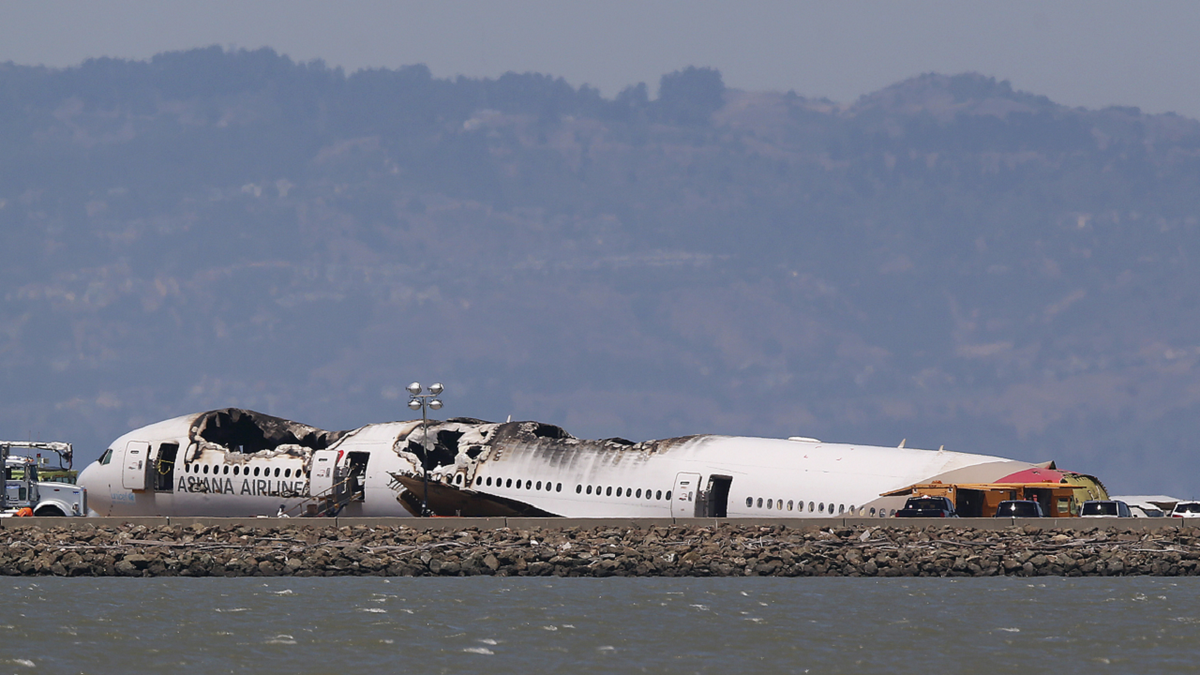 One of the images the passengers reportedly received Tuesday was of Asiana Airlines Flight 214, seen here sitting on the runway at San Francisco International Airport in San Francisco, Calif., after crashing in 2013.