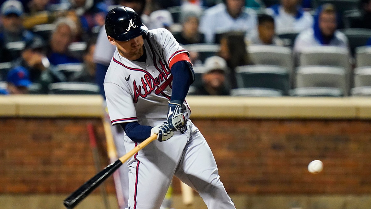 Atlanta Braves' Austin Riley hits a home run during the fourth inning of a baseball game against the New York Mets Monday, May 2, 2022, in New York.