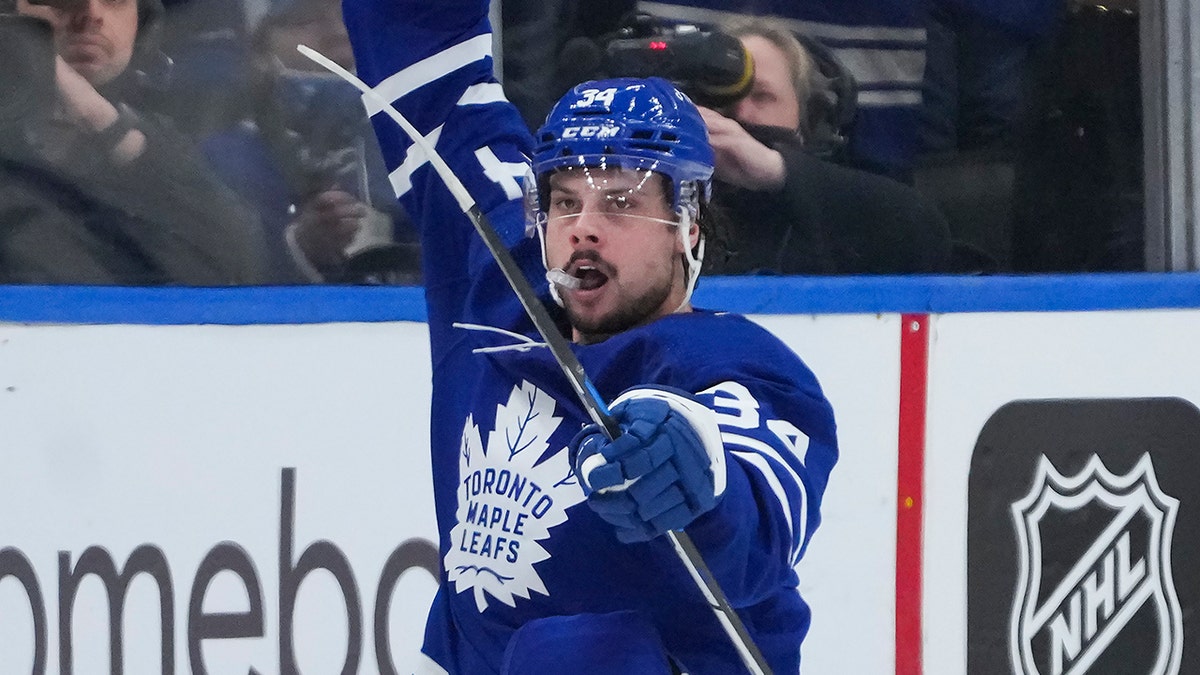 Toronto Maple Leafs forward Auston Matthews (34) scores the game winning goal against then Tampa Bay Lightning during third period of Game 5 of an NHL hockey Stanley Cup first-round playoff series, Tuesday, May 10, 2022, in Toronto.