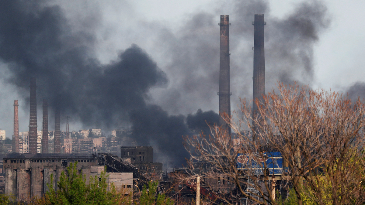 Smoke rises above the Azovstal Iron and Steel Works factory in the southern port city of Mariupol, Ukraine on Monday, May 2.