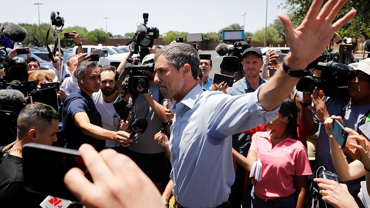 Beto O'Rourke speaks with reporters